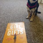 Chihuahua with book The Girl With All The Gifts